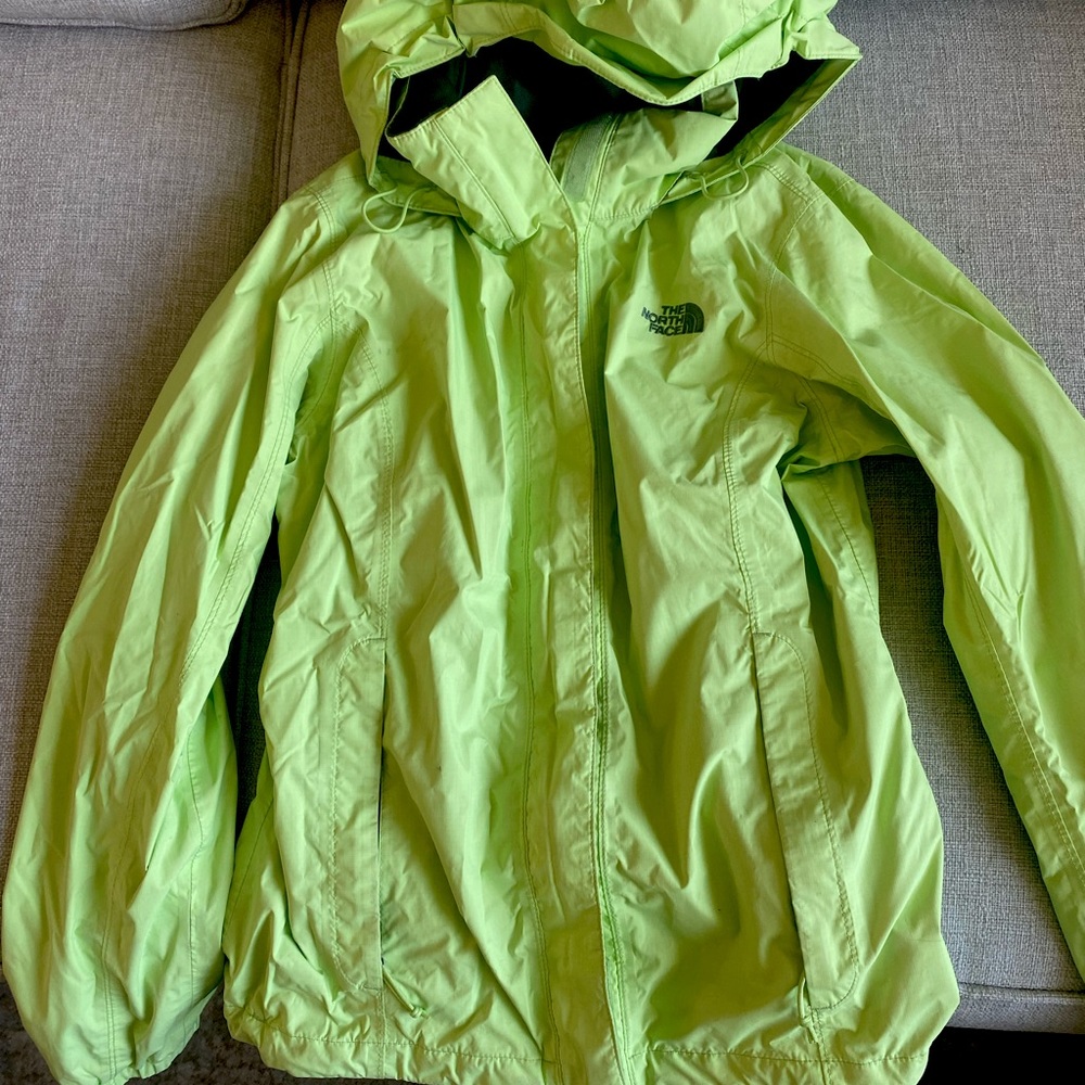 Lime green north face rain jacket w/ hood &adjustable waist and hood. Size SMALL